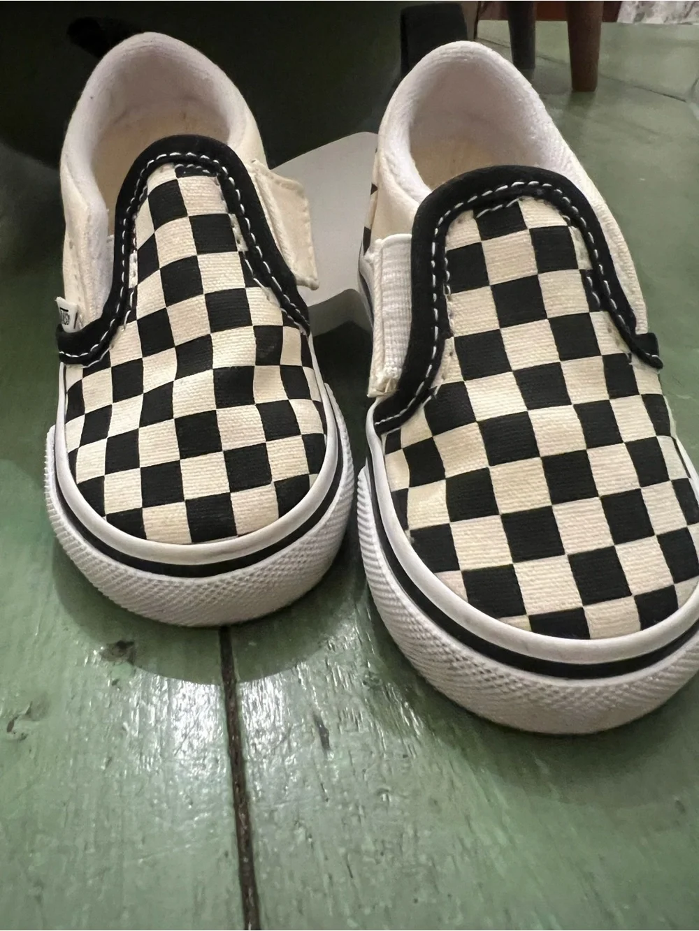 Vans Kids Slip-On Sneakers in Black and White Checkerboard size 4